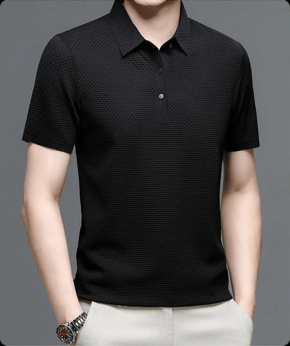 Men's Belro mesh polo shirt in navy with short sleeves and collar, displayed on a hanger against a plain background.