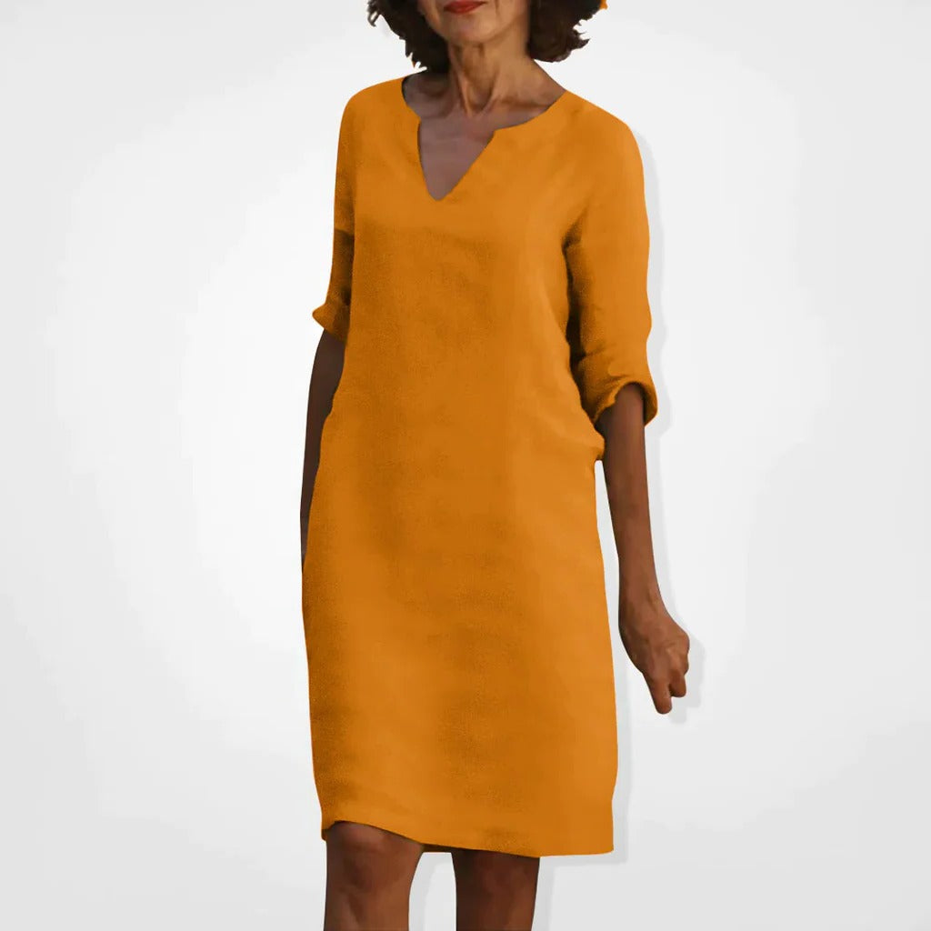 Belro summer dress with V-neck, lightweight fabric, sleeveless design, and casual fit perfect for warm weather.