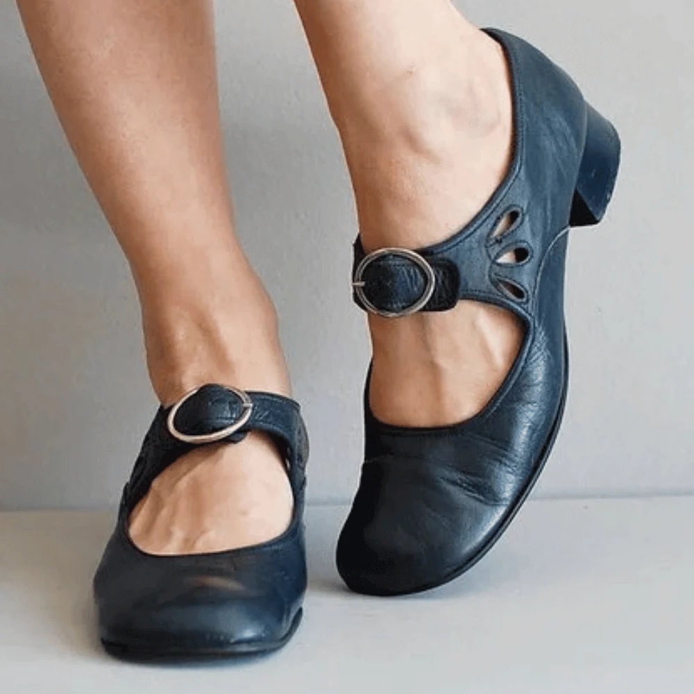 Belro leather sandals featuring a unique strap design, open-toe style, and casual summer footwear for women.