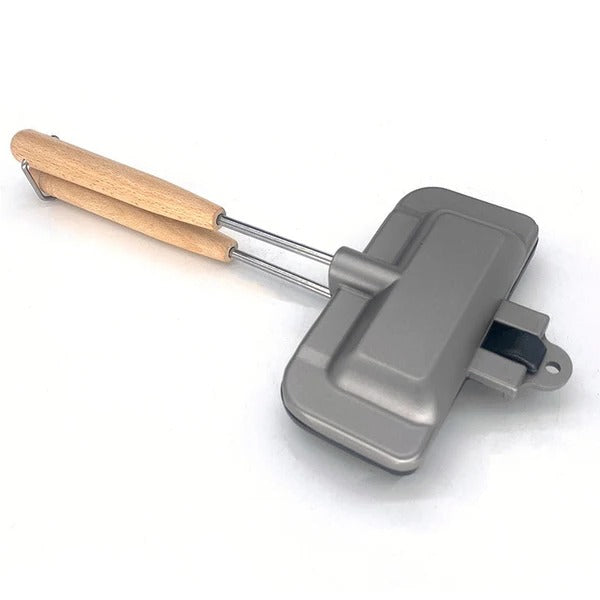 Belro double-sided non-stick sandwich pan with handles, showing the cooking surface and sandwich inside for even grilling.