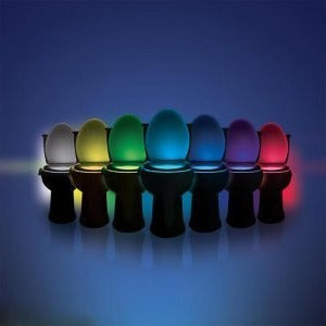 Belro LED toilet night light illuminating a bathroom toilet with soft, colorful glow for nighttime visibility and convenience.