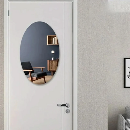 Oval-shaped Belro adhesive mirror mounted on a wall, showcasing its sleek, reflective surface and easy-to-apply design.