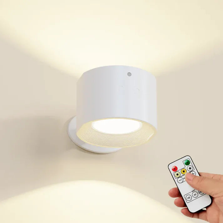 Belro LED rechargeable wall light mounted outdoors, illuminating a garden wall with bright, energy-efficient LED lighting.