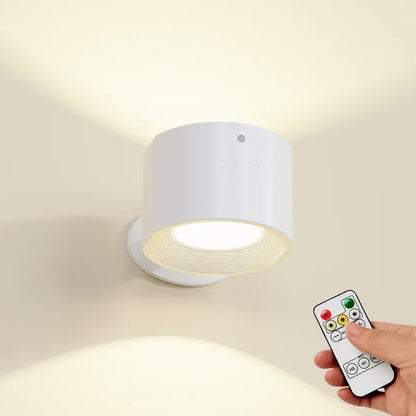 Belro LED rechargeable wall light mounted outdoors, illuminating a garden wall with bright, energy-efficient LED lighting.