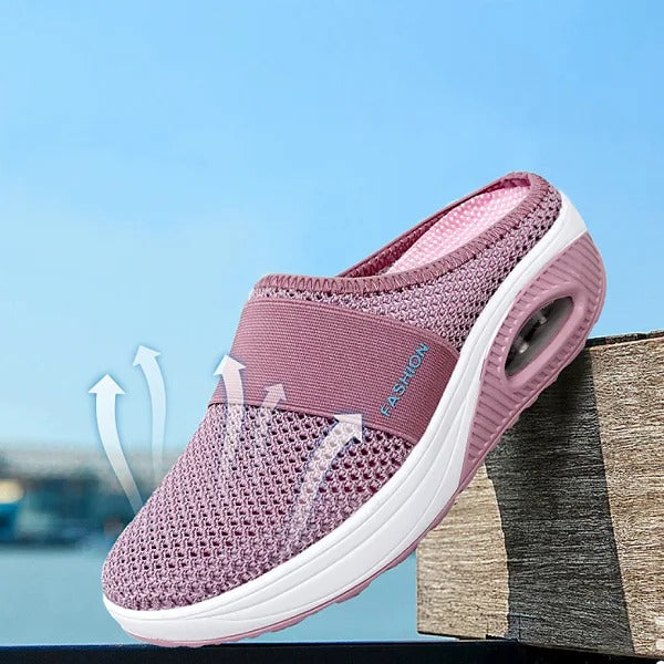 Belro orthopedic wedge sandals with supportive design, displayed as stylish slippers with cushioned soles and strap details.