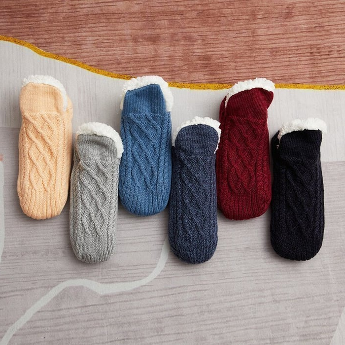 Belro indoor non-slip thermal socks displayed on a foot, featuring cozy fabric and grip soles for winter comfort.