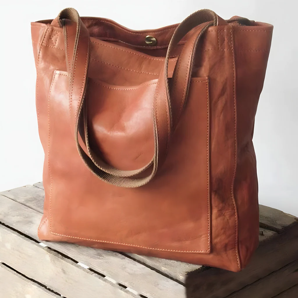 Women's leather bag by Belro, stylish accessory with a sleek design, featuring a structured shape and elegant leather finish.