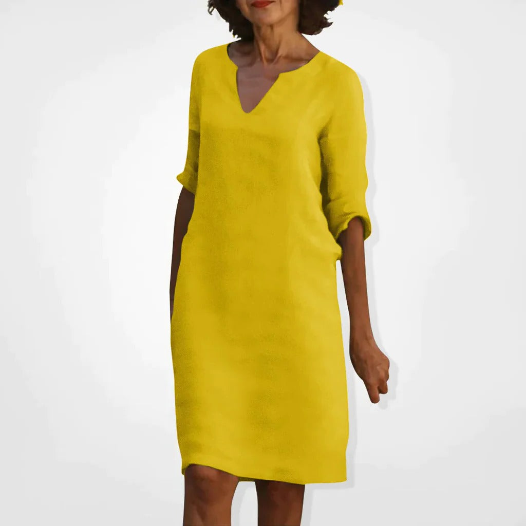 Belro summer dress with V-neck, lightweight fabric, sleeveless design, perfect for warm weather and casual occasions.