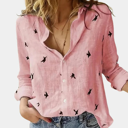 Women's long sleeve shirt by Belro, in soft fabric with a relaxed fit, shown in a neutral color on a hanger.