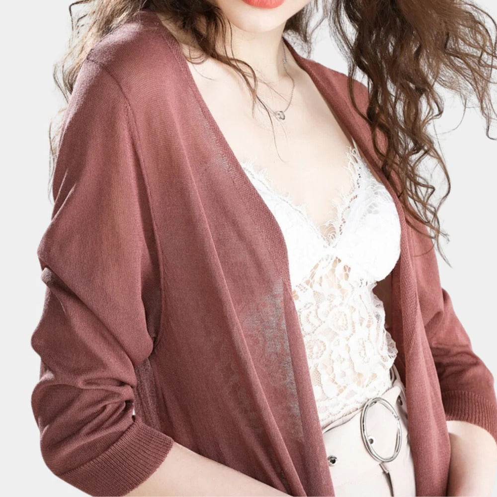 Lightweight women's vest by Belro, elegant sleeveless clothing item with a sleek design and neutral color.