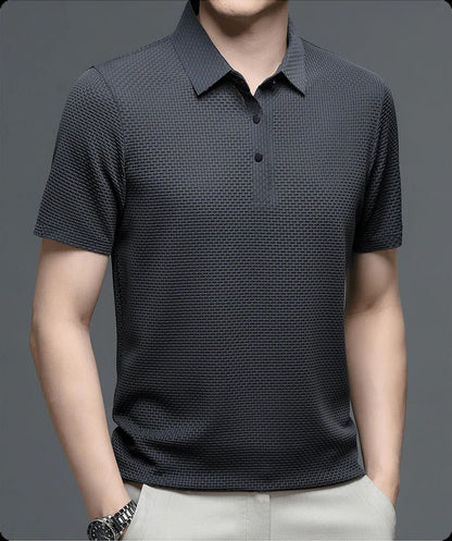 Men's Belro mesh polo shirt in navy, featuring short sleeves and breathable fabric, displayed flat on a white background.