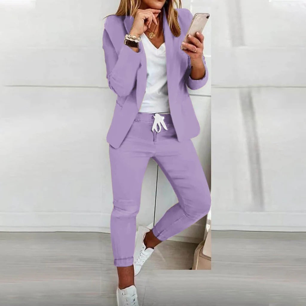 Belro blazer set with matching pants, stylish and comfortable clothing ensemble, shown in a well-fitted professional look.