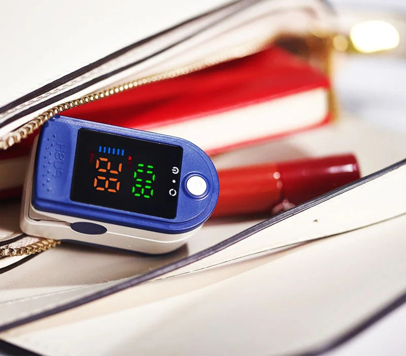 Belro blood oxygen meter displaying digital readout on a compact electronic monitor for health monitoring.