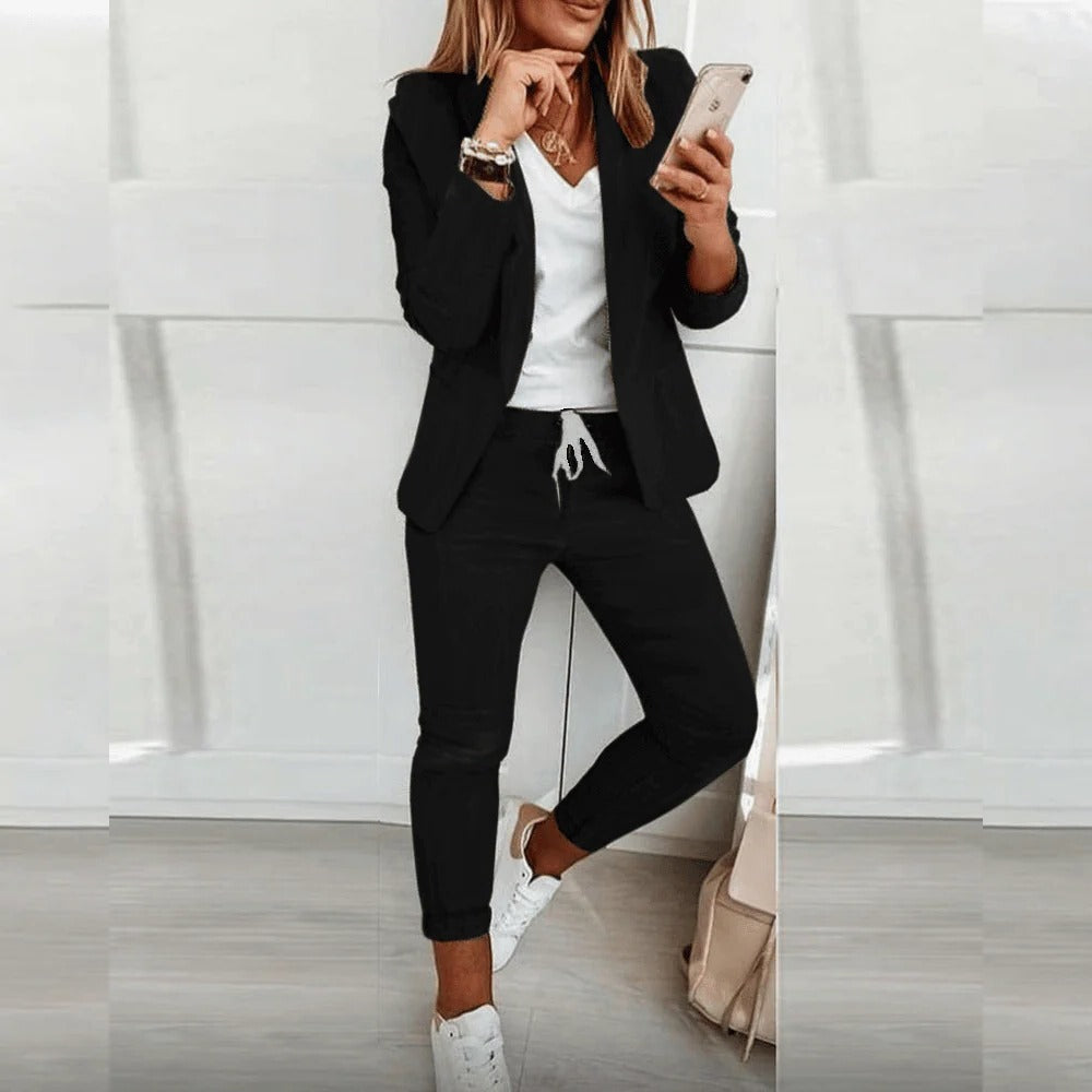 Belro blazer set with tailored pants, featuring a sleek, elegant design and comfortable fit, perfect for professional or formal wear.