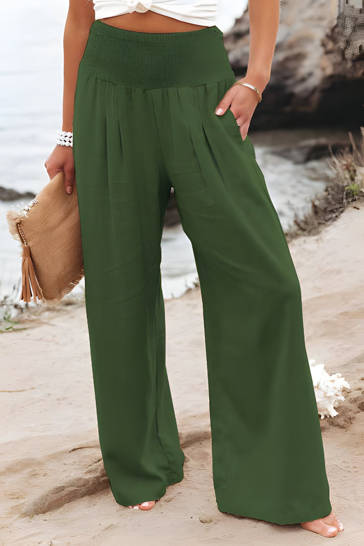 Women’s comfortable linen trousers by Belro, featuring a relaxed fit and natural beige color, perfect for casual wear.