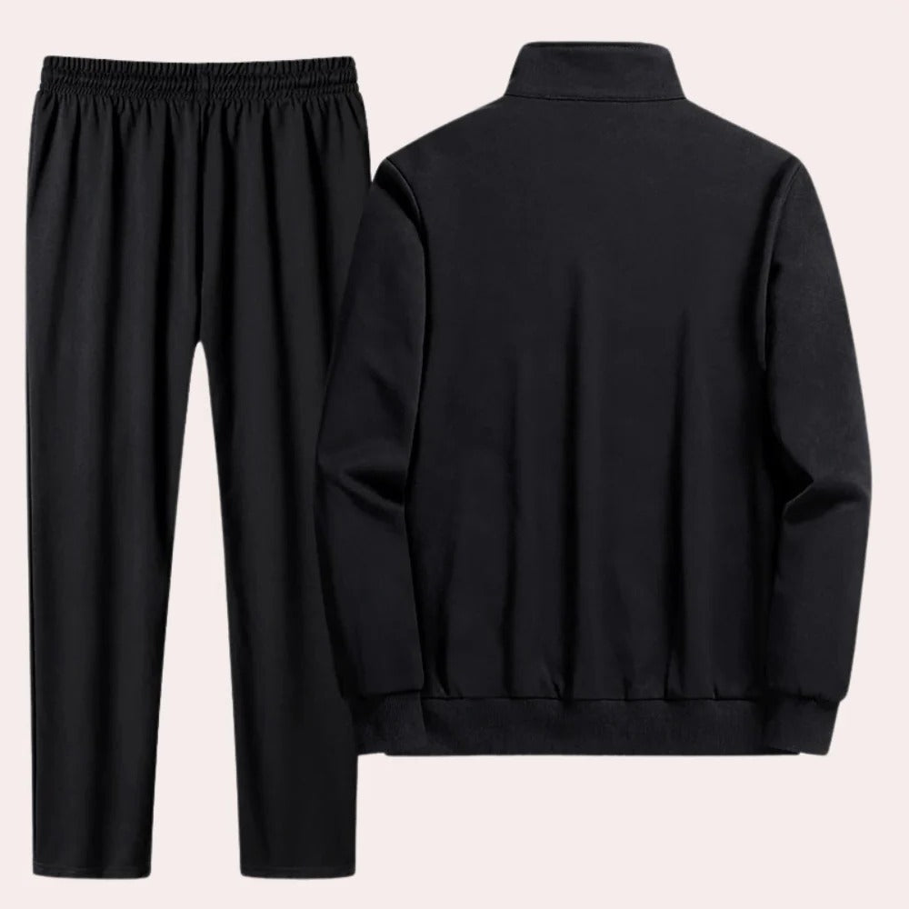 Comfortable men's Belro tracksuit in navy blue, featuring a zip-up jacket and matching joggers for activewear.