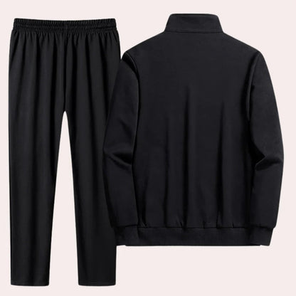 Comfortable men's Belro tracksuit in navy blue, featuring a zip-up jacket and matching joggers for activewear.