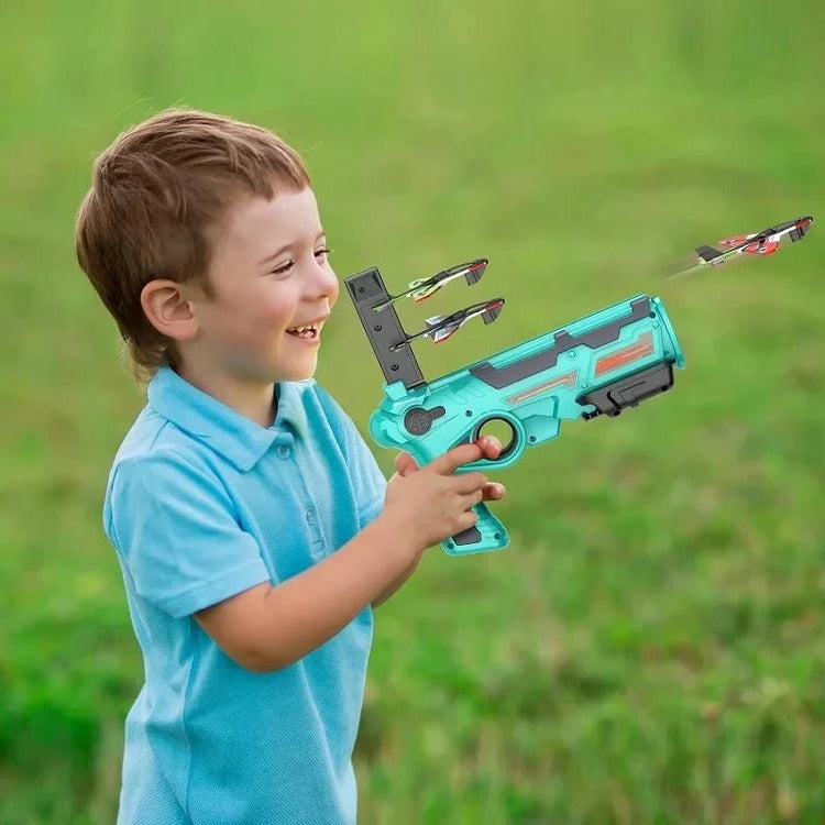 Belro SkyGlider aircraft launcher toy with colorful plastic plane ready to be launched in a playroom setting.