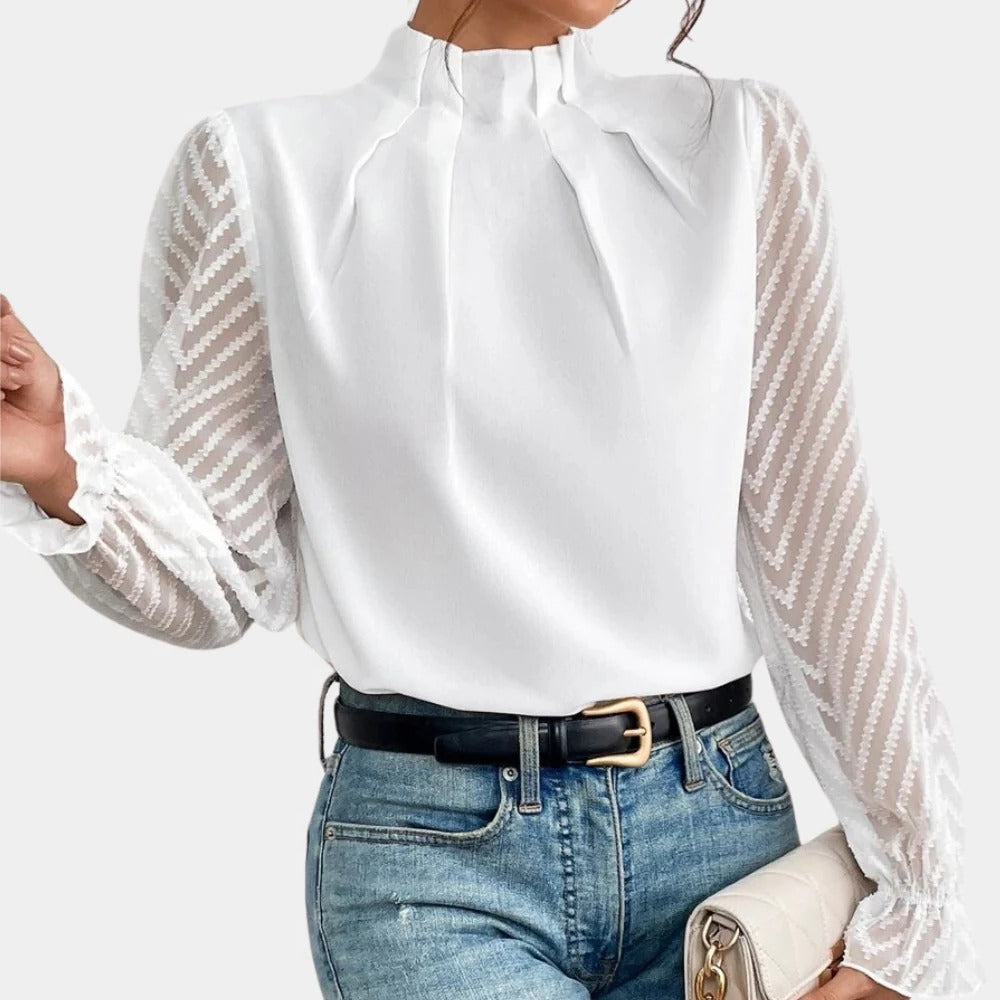 Women’s long sleeve sleepwear top by Belro, soft fabric, casual fit, shown in a cozy, relaxed style.