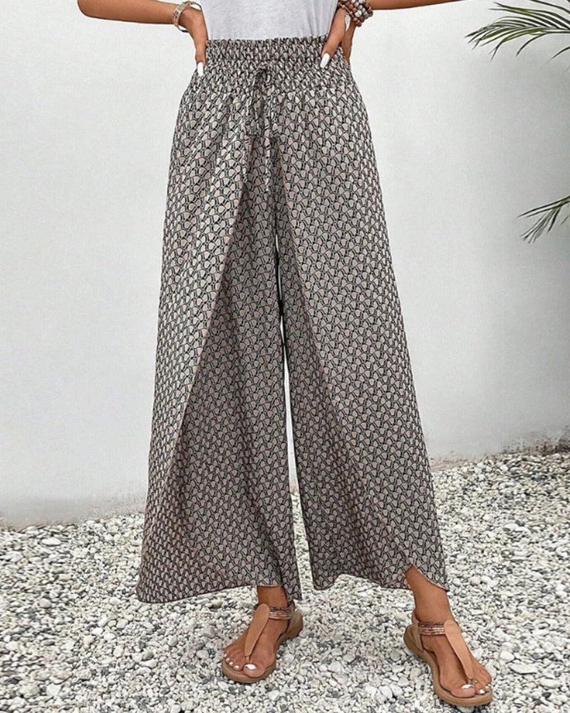 Women's Belro trousers with a geometric print, featuring a stylish and comfortable design for casual or office wear.