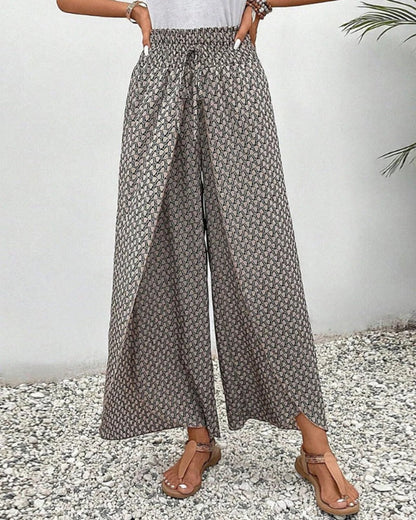 Women's Belro trousers with a geometric print, featuring a stylish and comfortable design for casual or office wear.