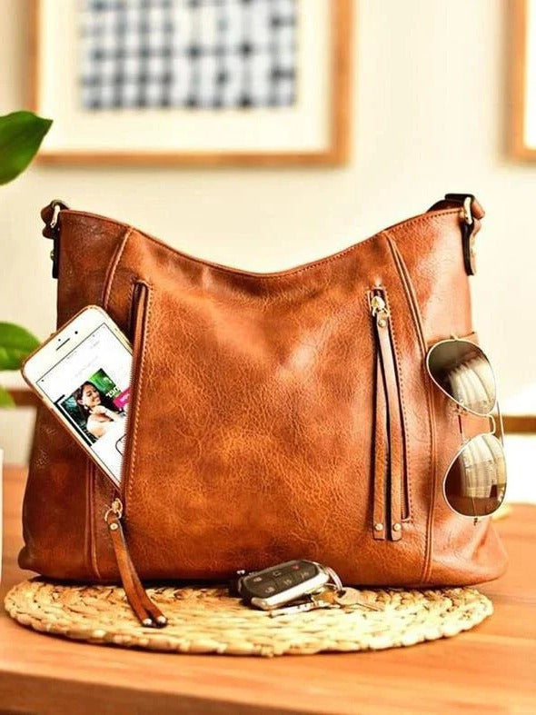 Vintage leather ladies' bag by Belro with a classic design, featuring elegant stitching and a polished finish.
