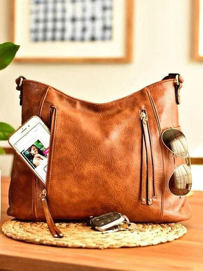 Vintage leather ladies' bag by Belro with a classic design, featuring elegant stitching and a polished finish.