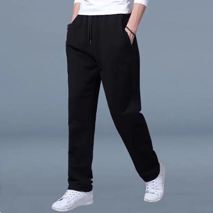 Belro men's jogging pants in black, made of comfortable athletic fabric, featuring an elastic waistband and side pockets.