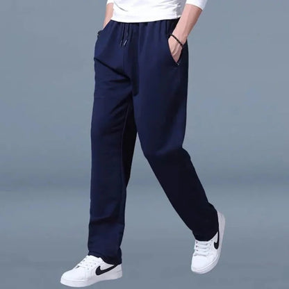 Men's Belro jogging pants in black with side pockets, made from comfortable athletic fabric, suitable for running or casual wear.
