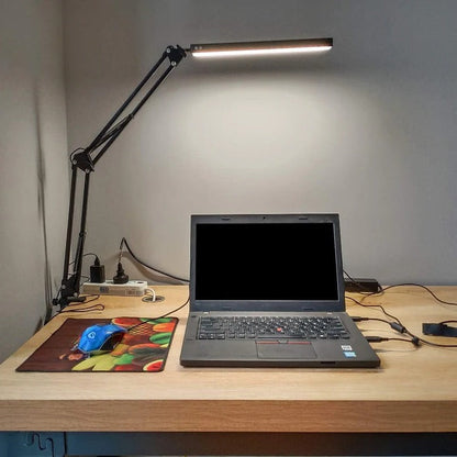 Belro LED desk lamp with clamp, adjustable arm and bright light for desk or workspace illumination.