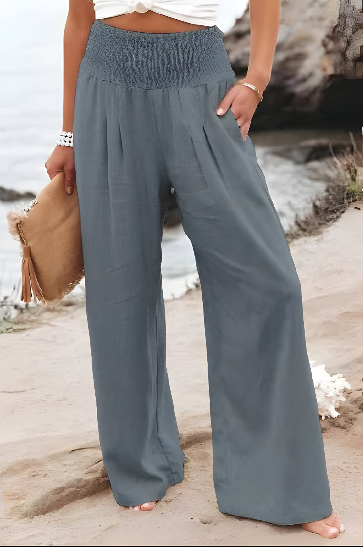 Comfortable linen trousers for women by Belro, featuring a relaxed fit and natural beige color, perfect for casual wear.
