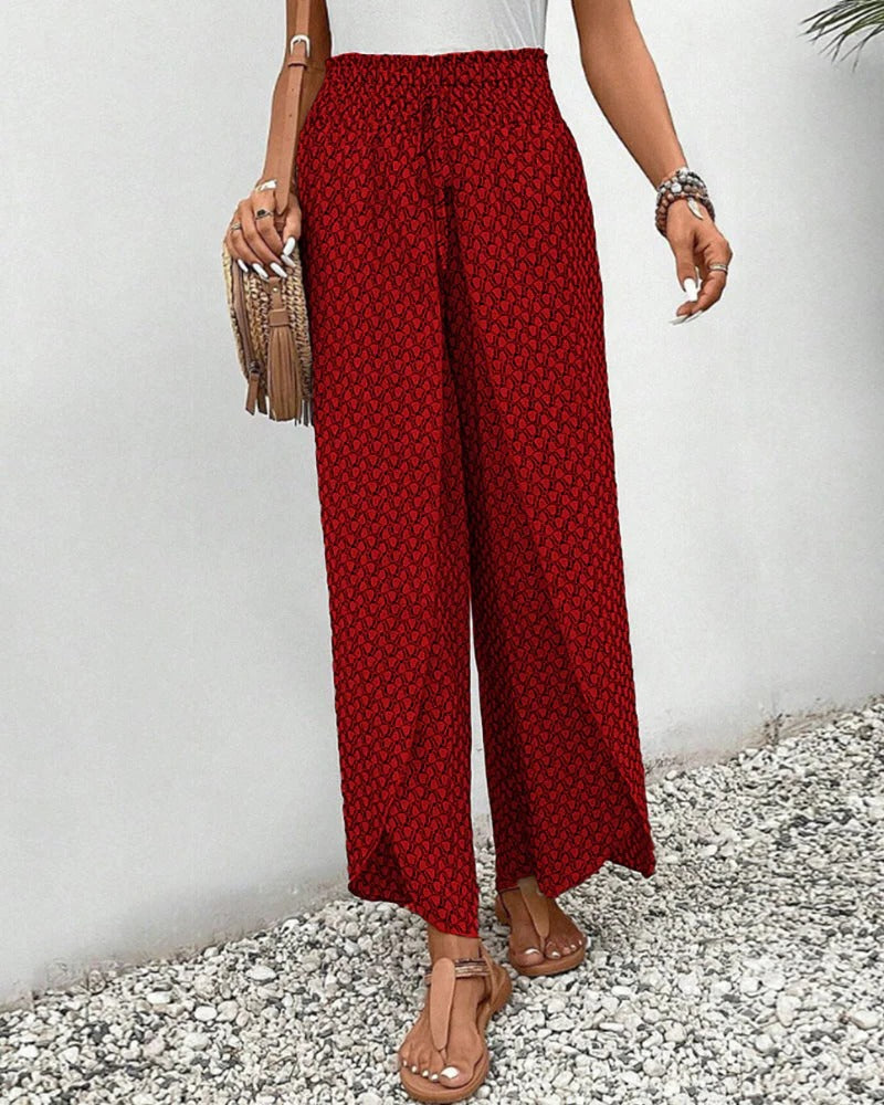 Women’s Belro trousers with a bold geometric print, featuring stylish tailored design and comfortable fit.