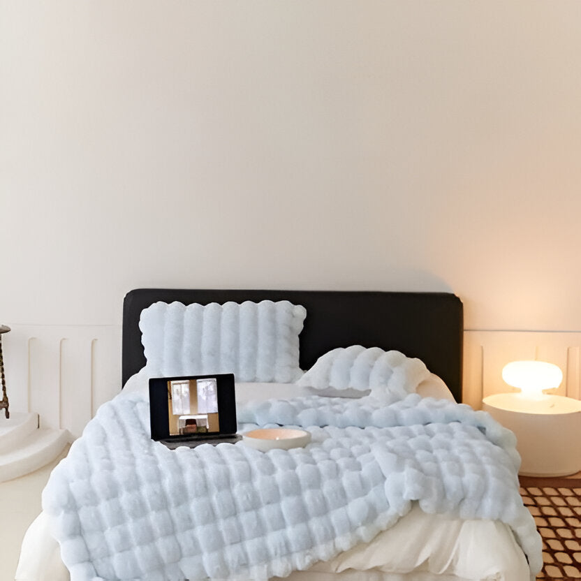 Belro all-season blanket with elegant design, soft fabric, and cozy appearance for home bedding and living space decor.