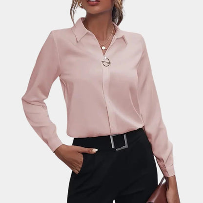 Plain elegant ladies blouse by Belro featuring a classic, stylish top made from soft fabric, shown in a neutral color.