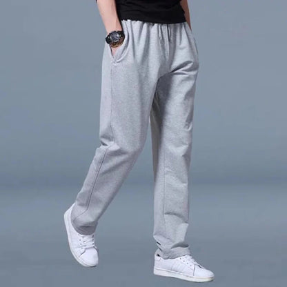 Belro men's jogging pants in black, featuring elastic waistband and relaxed fit, suitable for casual and athletic wear.