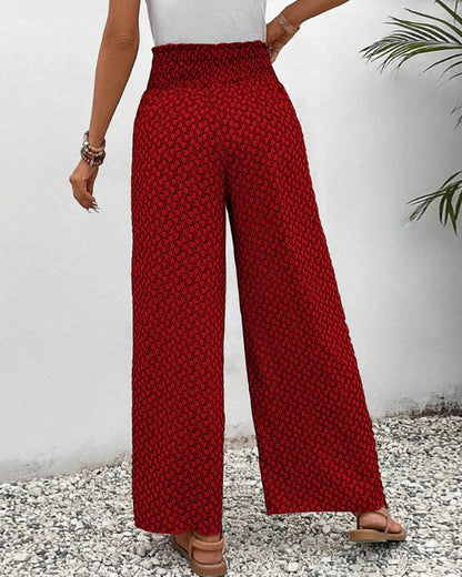 Women's Belro trousers featuring a stylish geometric print, made from comfortable fabric for a modern, fashionable look.