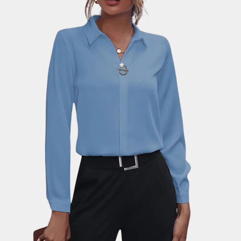 Elegant plain ladies blouse by Belro, featuring a smooth fabric and classic design, perfect for casual or formal wear.