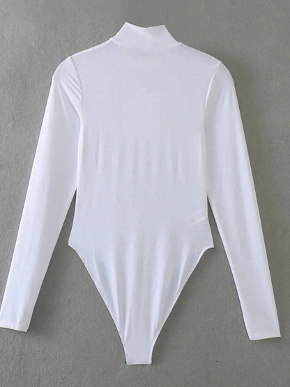 Black long sleeve bodysuit with turtleneck collar by Belro, featuring fitted design and seamless fabric for a sleek look.