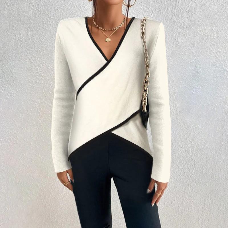 Ivory Belro V-neck sweater made of soft knit fabric, close-up of the neckline and smooth texture.