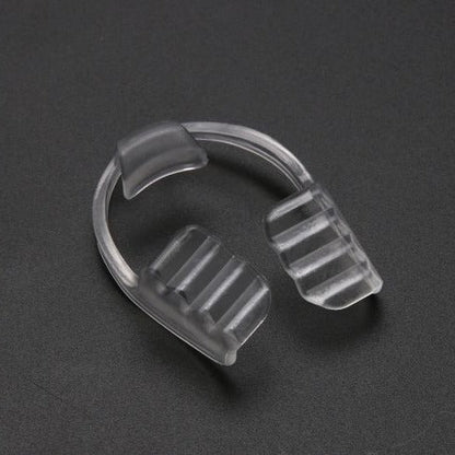 Belro mouth guard for teeth grinding and clenching, showing a clear dental guard fitted in a person's mouth for oral protection.