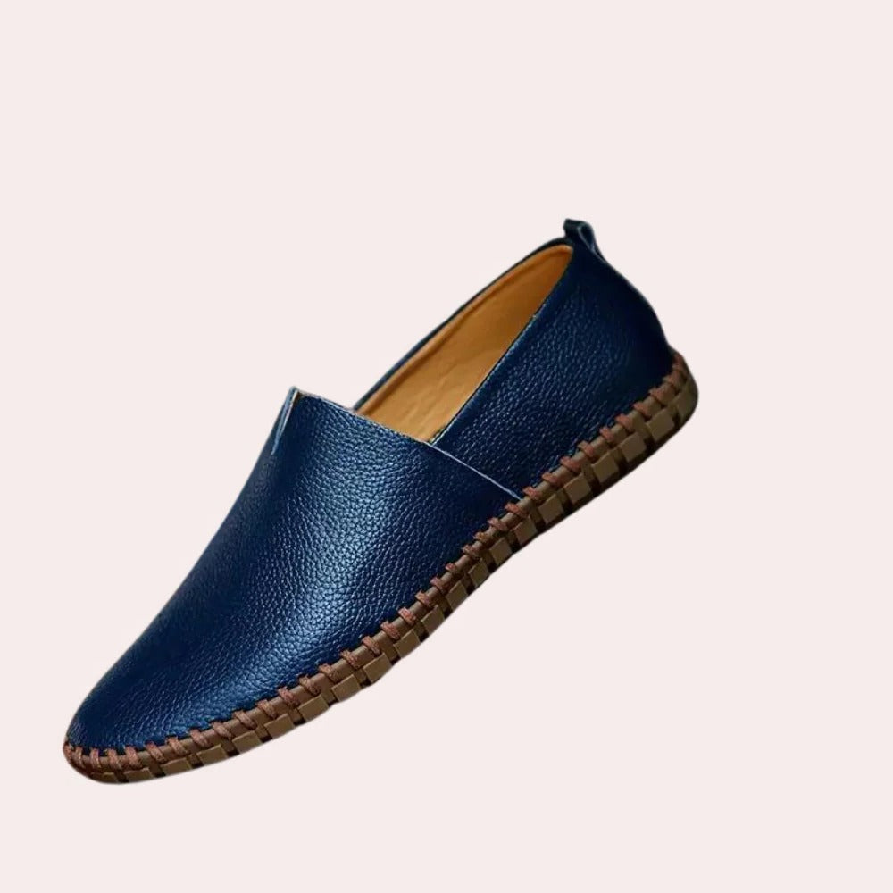 Belro men's slip-on slippers with soft fabric upper and cushioned sole, ideal for comfortable indoor footwear.