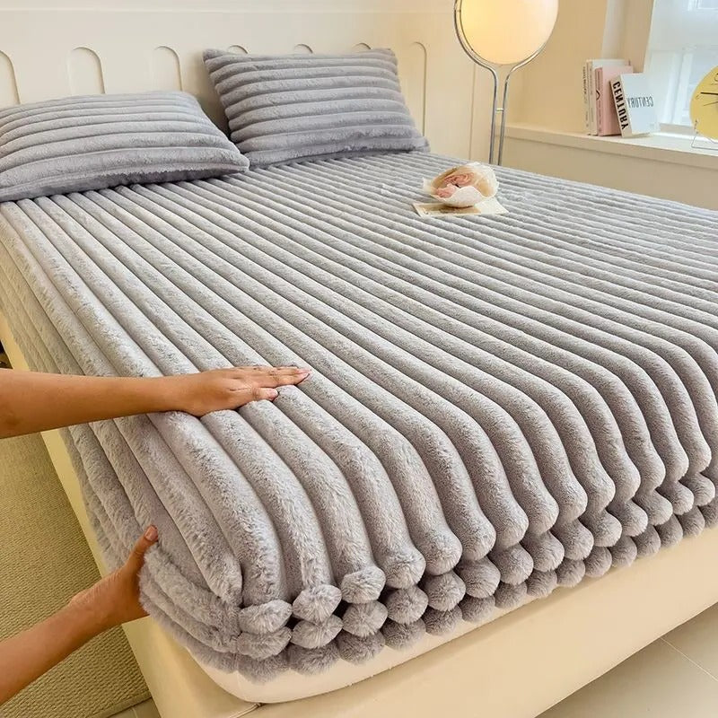Belro ultra-soft luxury fitted bed sheet in a cozy, smooth fabric with elastic edges for a perfect fit on a bed.