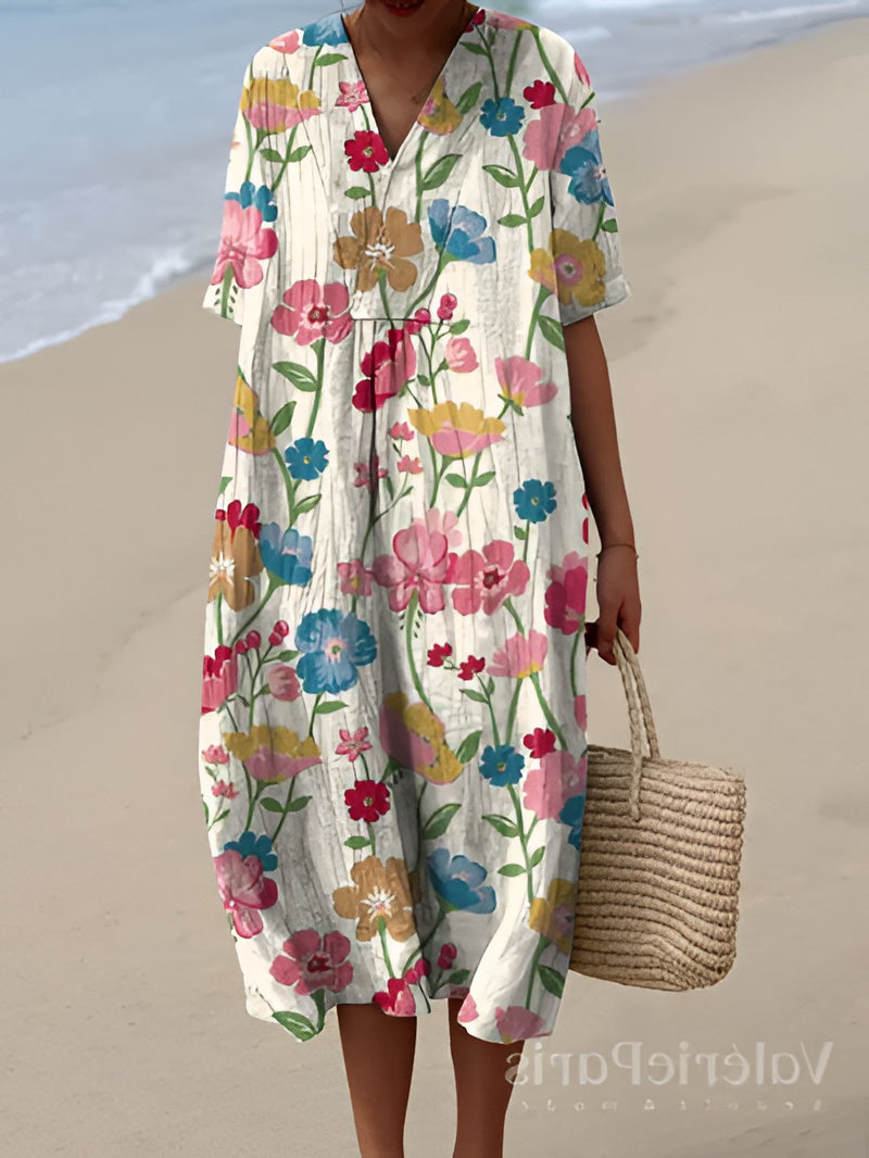 Belro beautiful summer dress with floral pattern, sleeveless design, and flowing fabric perfect for warm weather.