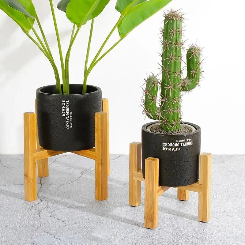 Belro wooden plant pot trays for outdoor gardening, showcasing natural wood finish and drainage features.