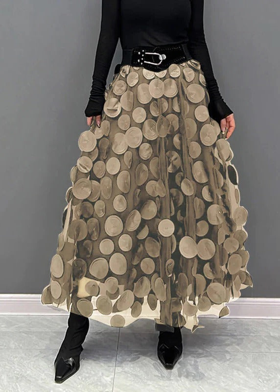 Belro polka dot and tulle patchwork skirt, stylish clothing item with layered fabric and playful pattern, displayed on a hanger.