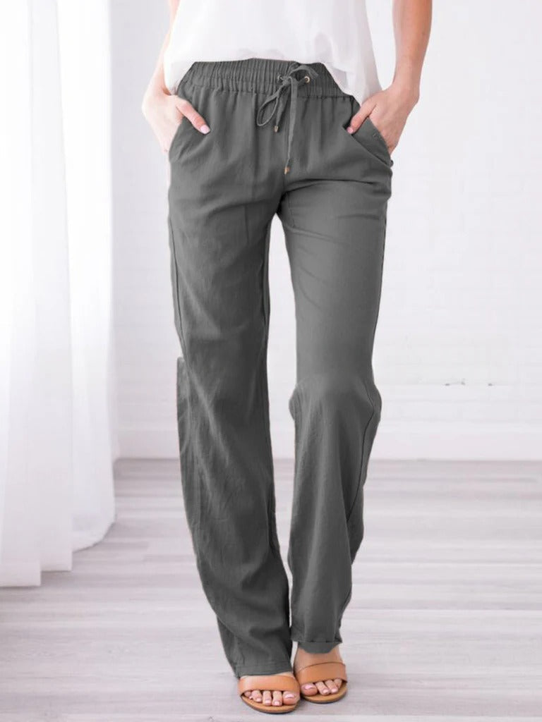 Belro summer trousers in lightweight fabric, featuring a relaxed fit and neutral color, perfect for casual warm-weather wear.