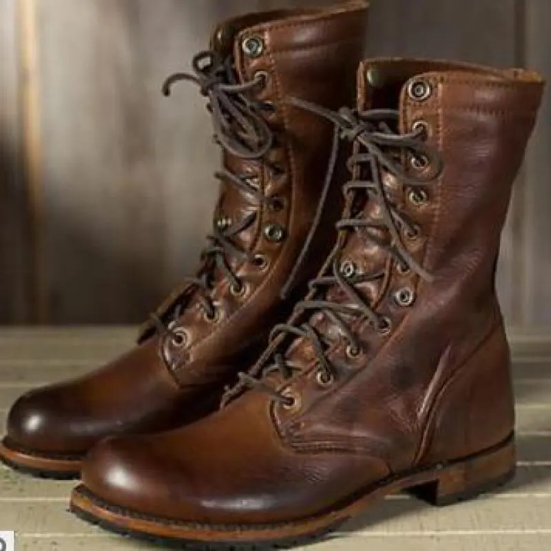 Belro women's boots featuring ankle-high design, black leather material, stylish laces, and sturdy sole for everyday wear.