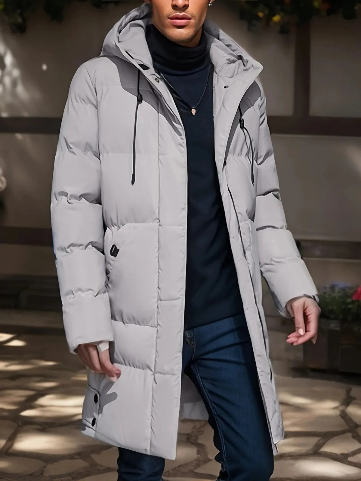 Belro men's long winter jacket, waterproof and warm, featuring a hood and full-length zipper for cold weather protection.