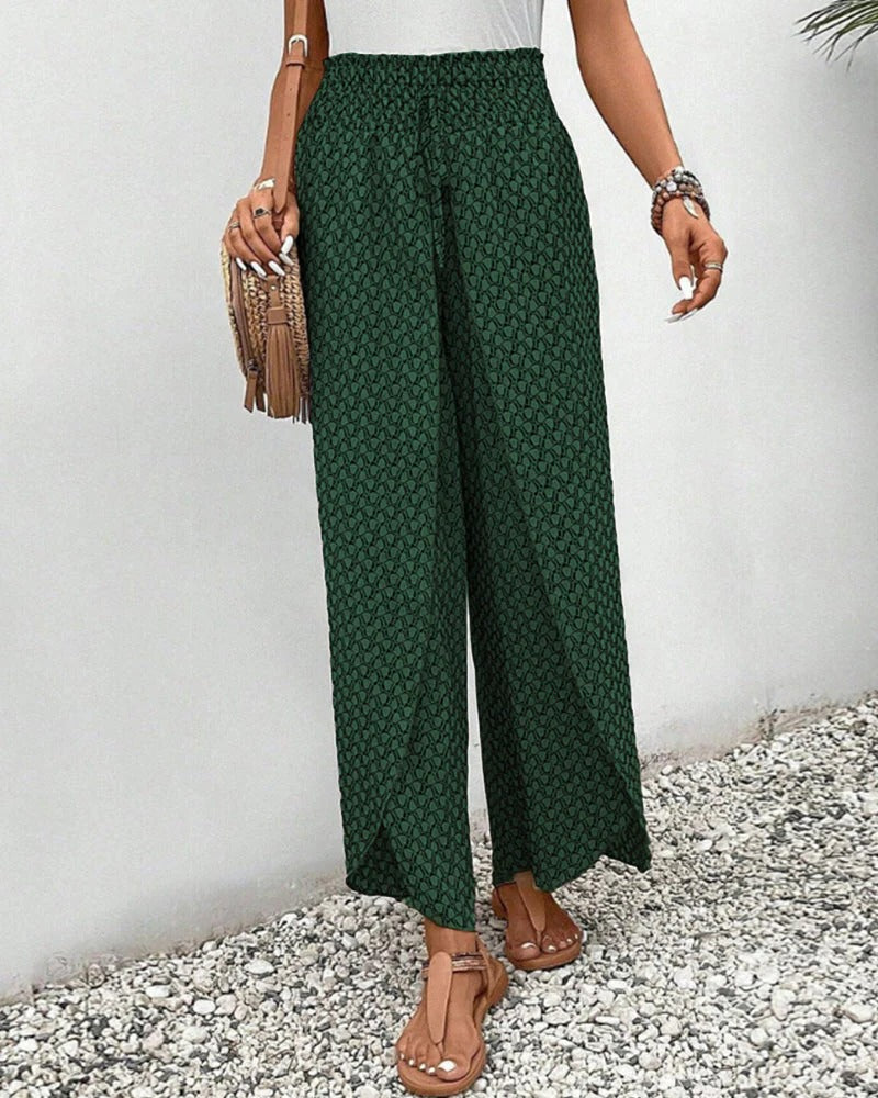 Women's Belro trousers with a bold geometric print, stylish and comfortable pants for casual or work wear.