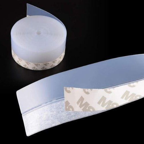 Belro self-adhesive door seal strip attached to a door frame, provides insulation and draft protection in tools and hardware setting.